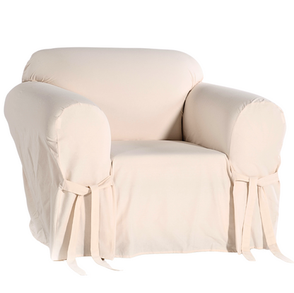 natural colored armchair covered with a fitted slipcover on a white background