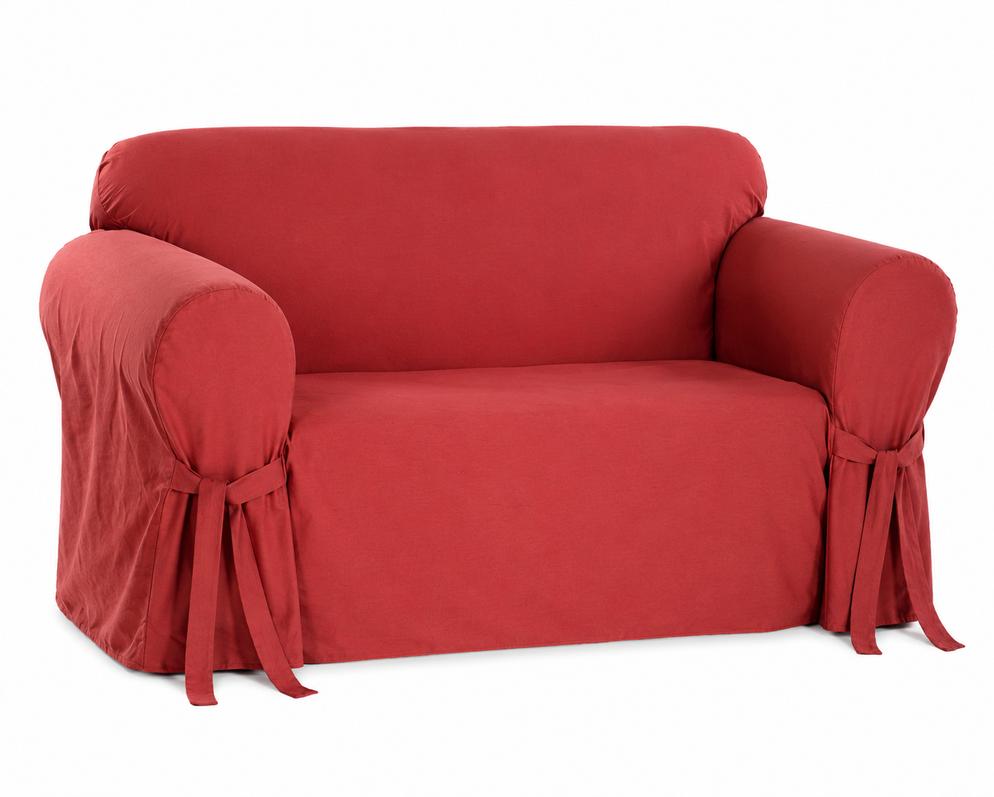 red loveseat covered with a fitted slipcover on a white background